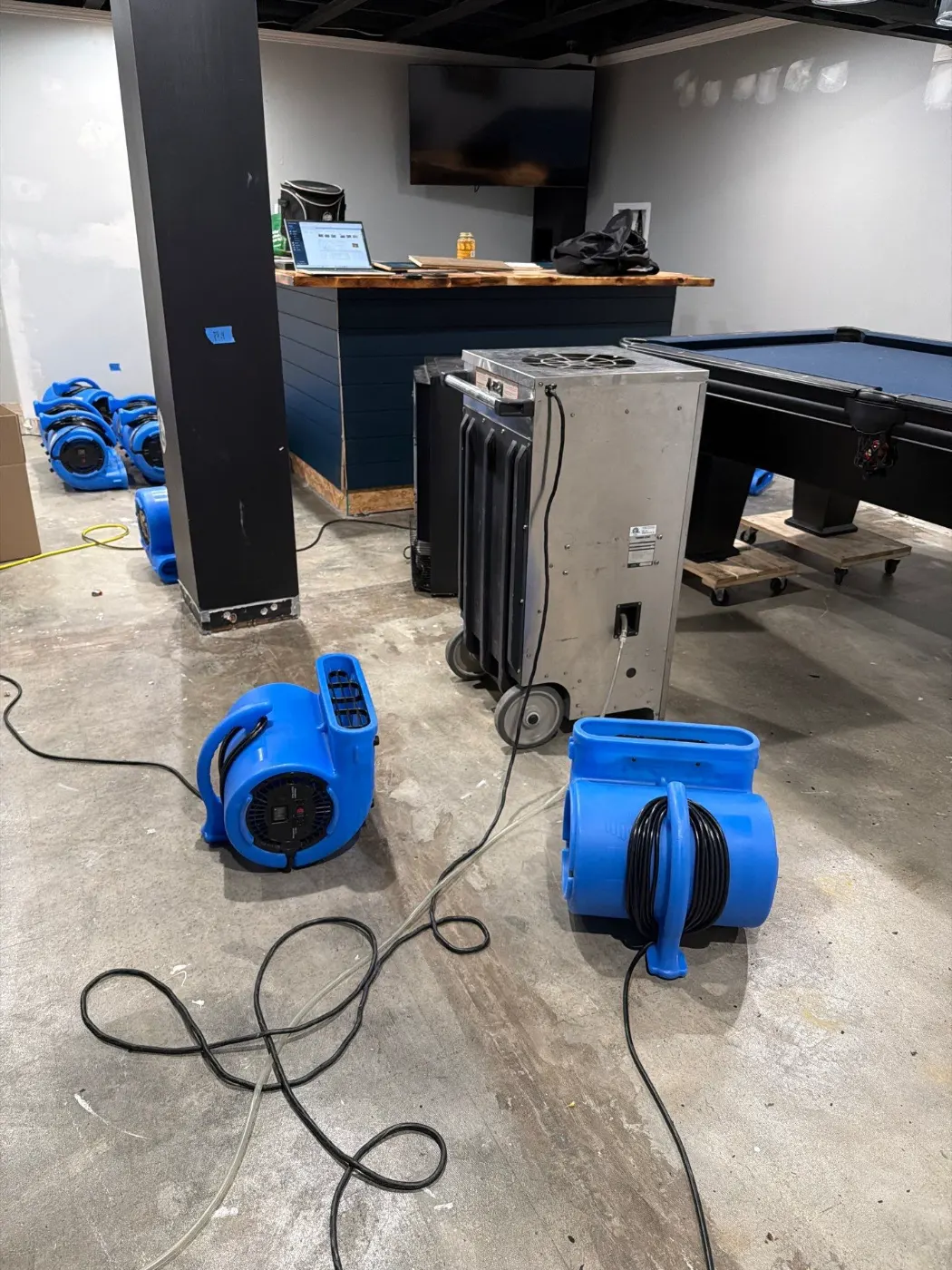 Drying setup in Seymour finished basement after water event